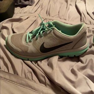 Gray and sea foam green nike tennis shoes